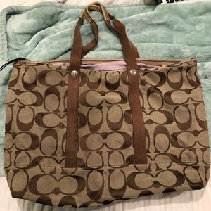 Large gold Coach brand tote bag